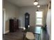 This elegant dining room features modern lighting, a sleek table, and classic decor, perfect for memorable gatherings at 40 N Park Ave, Martinsville, IN 46151