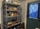 Pantry shelving stocked full of canned and preserved goods, offering ample food storage at 40 N Park Ave, Martinsville, IN 46151