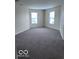 Spacious bedroom featuring neutral carpet and natural light at 4070 Presidio Cir, Indianapolis, IN 46235