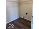 This closet features wood-look flooring and wire shelving at 4070 Presidio Cir, Indianapolis, IN 46235