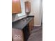 Well-lit kitchen with laminate countertops and black appliances at 4070 Presidio Cir, Indianapolis, IN 46235