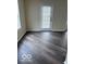 Spacious living room featuring hardwood flooring and natural light at 4070 Presidio Cir, Indianapolis, IN 46235