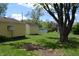 Spacious backyard showcasing multiple storage sheds at 4736 Madison Ave, Indianapolis, IN 46227