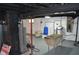The basement features painted floors and walls, with updated utilities, including a water softener at 4736 Madison Ave, Indianapolis, IN 46227