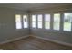 This bedroom is full of natural light and has new flooring and paint at 4736 Madison Ave, Indianapolis, IN 46227
