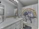 bathroom featuring a whimsical shower curtain and framed mirror above the sink at 4759 Silver Hill Dr, Greenwood, IN 46142