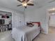 Comfortable bedroom with ceiling fan and closet with workstation, offering versatile space at 4759 Silver Hill Dr, Greenwood, IN 46142