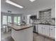 Well-lit kitchen featuring stainless steel appliances and island at 4759 Silver Hill Dr, Greenwood, IN 46142