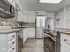 Well-lit kitchen featuring stainless steel appliances and island at 4759 Silver Hill Dr, Greenwood, IN 46142