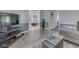 Comfortable living room showcases a TV and shelving unit, plus nice flooring at 4759 Silver Hill Dr, Greenwood, IN 46142