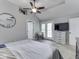 The main bedroom features a ceiling fan, ensuite bathroom, and access to a patio at 4759 Silver Hill Dr, Greenwood, IN 46142