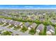 An aerial view showcasing a serene neighborhood with a pond and lush greenery at 4809 Ozark Ln, Indianapolis, IN 46239