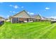 Well-maintained backyard with lush green lawn perfect for outdoor activities and relaxation at 4809 Ozark Ln, Indianapolis, IN 46239