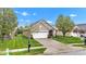 Well-maintained single-story home with a manicured lawn, two-car garage and inviting curb appeal at 4809 Ozark Ln, Indianapolis, IN 46239