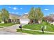 Beautiful single-story home featuring a two-car garage and a beautifully landscaped front yard at 4809 Ozark Ln, Indianapolis, IN 46239