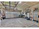 Spacious garage with ample room for multiple vehicles and overhead storage at 4809 Ozark Ln, Indianapolis, IN 46239