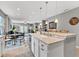 Open kitchen with island seating area perfect for entertaining or relaxing at 4809 Ozark Ln, Indianapolis, IN 46239