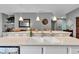 Bright kitchen features quartz countertops, stainless steel faucet, and pendant lighting at 4809 Ozark Ln, Indianapolis, IN 46239