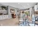 Open-concept living space with a dining area, kitchen, and cozy seating arrangement at 4809 Ozark Ln, Indianapolis, IN 46239
