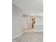 Hallway leading to a laundry room, offering modern convenience and ample space at 4844 Morenci Ct, New Palestine, IN 46163