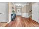 Bright foyer with hardwood floors, decorative molding, and a stylish entryway table at 4857 Silverbell Dr, Plainfield, IN 46168