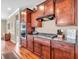 Chef's kitchen featuring stainless steel appliances, gas cooktop, and ample cabinet space at 4857 Silverbell Dr, Plainfield, IN 46168