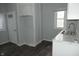 Kitchen featuring white cabinets, marble countertops, and a stainless steel faucet at 509 N Emerson Ave, Indianapolis, IN 46219