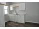 New kitchen featuring white cabinets, marble countertops, and a stainless steel faucet at 509 N Emerson Ave, Indianapolis, IN 46219