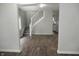 Open living space featuring staircase, modern floors and neutral paint at 509 N Emerson Ave, Indianapolis, IN 46219