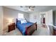 Light-filled bedroom featuring carpet, closet, windows, and simple decor at 517 S 4Th Ave, Beech Grove, IN 46107