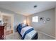 Serene bedroom featuring soft carpet, natural light, and neutral decor at 517 S 4Th Ave, Beech Grove, IN 46107