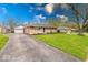 Charming home with a well-maintained lawn, driveway, and welcoming curb appeal at 517 S 4Th Ave, Beech Grove, IN 46107