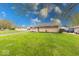 Charming single-story home featuring a brick and stone facade with a well-manicured lawn at 517 S 4Th Ave, Beech Grove, IN 46107
