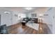 Inviting living room featuring hardwood floors, comfortable seating, and natural light at 517 S 4Th Ave, Beech Grove, IN 46107