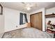 Bedroom featuring a ceiling fan, natural light, and closet space, offering a comfortable and functional design at 5320 S Lick Crk Rd, Morgantown, IN 46160