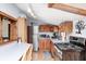 Well-equipped kitchen boasts stainless steel appliances, plenty of counter space, and cozy breakfast bar seating at 5320 S Lick Crk Rd, Morgantown, IN 46160
