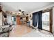 Open-concept space with a seamless flow, featuring natural wood, a bar, and easy access to outdoor entertaining at 5320 S Lick Crk Rd, Morgantown, IN 46160