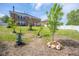 Well-maintained backyard with new tree plantings at 5422 Portman Dr, Noblesville, IN 46062