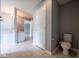 Neutral bathroom featuring tile floors, white vanity and toilet, and gray walls at 5422 Portman Dr, Noblesville, IN 46062