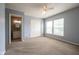 Bedroom with carpet flooring, ceiling fan, and natural light coming through windows at 5422 Portman Dr, Noblesville, IN 46062