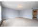Spacious bedroom with neutral carpet and light blue walls at 5422 Portman Dr, Noblesville, IN 46062