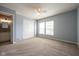 Bedroom showcasing carpet flooring, a ceiling fan, and natural light at 5422 Portman Dr, Noblesville, IN 46062