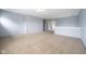 Bright bonus room featuring neutral carpet, light-blue walls, and an open layout at 5422 Portman Dr, Noblesville, IN 46062