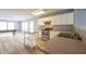 Open kitchen area featuring stainless steel appliances and eat-in counter, seamlessly connecting to the living space at 5422 Portman Dr, Noblesville, IN 46062