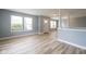 Bright living room featuring hard surface floors, neutral paint, and decorative columns at 5422 Portman Dr, Noblesville, IN 46062