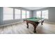 Bright living room featuring a pool table, and a view of the outdoors at 5422 Portman Dr, Noblesville, IN 46062