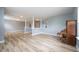 Open floor plan with decorative columns, neutral paint, and hard surface floors at 5422 Portman Dr, Noblesville, IN 46062