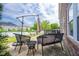 Cozy backyard patio with seating area and outdoor umbrella at 5422 Portman Dr, Noblesville, IN 46062