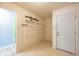 White storage room with wire shelving and vinyl flooring at 5422 Portman Dr, Noblesville, IN 46062