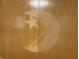 Close up of a wooden wall with star and moon graffiti at 5822 W 62Nd St, Indianapolis, IN 46278